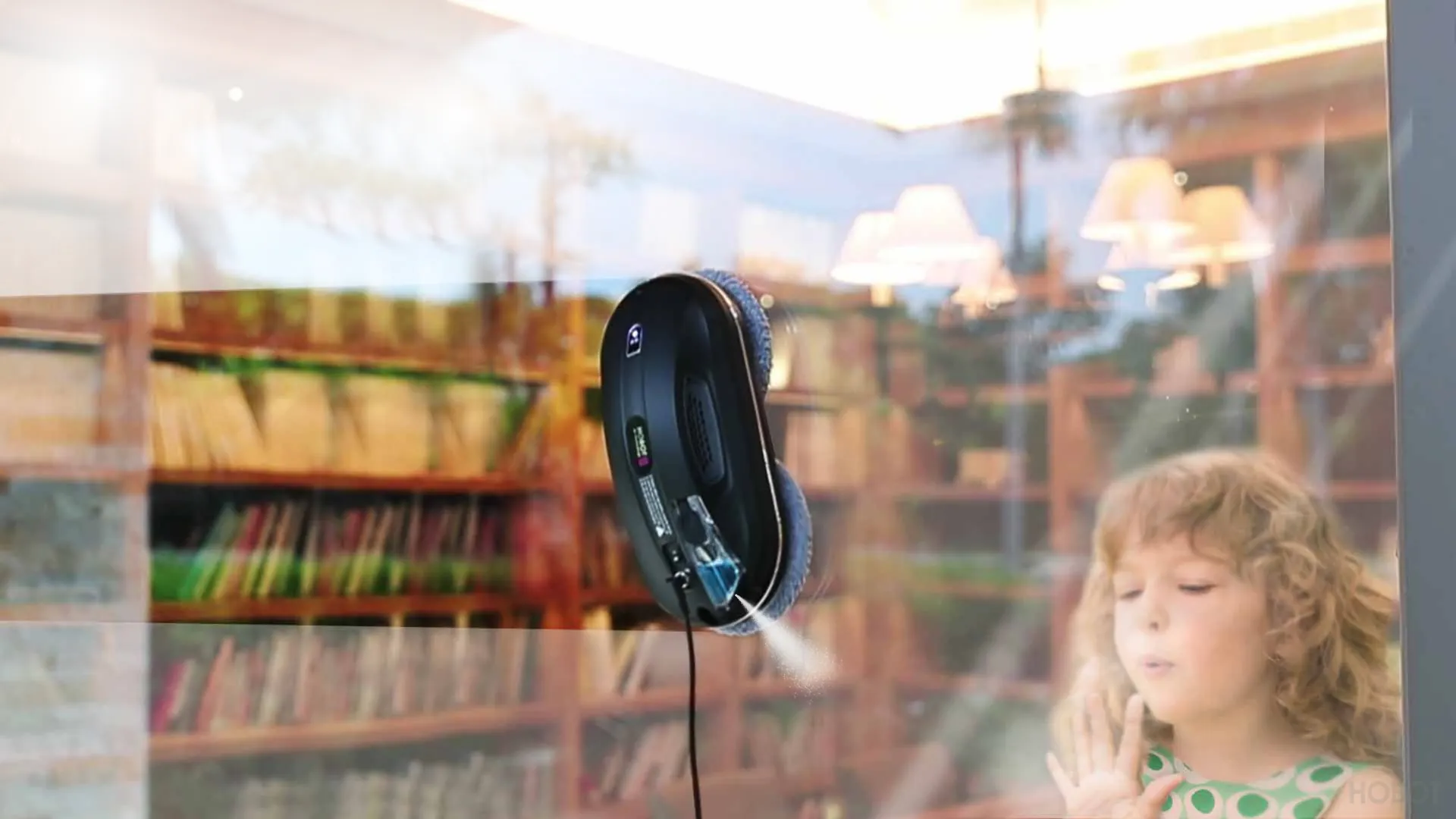 HOBOT 388 window cleaning robot cleaning a window